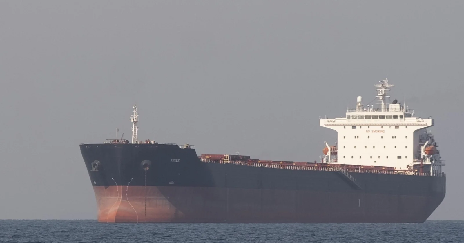 A merchant tanker under way in open water