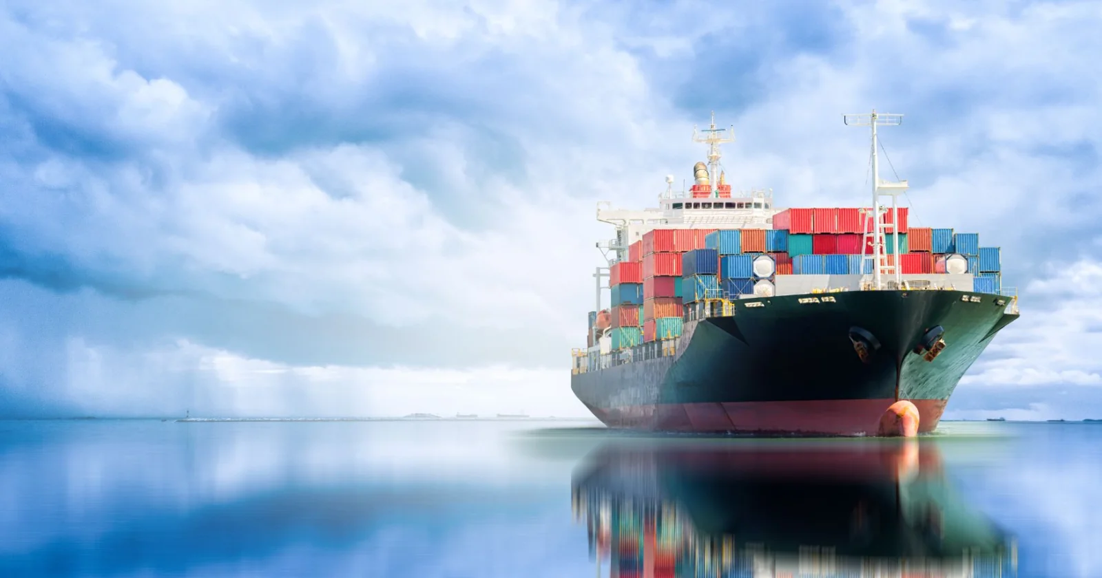 A laden container ship on an open-sea voyage