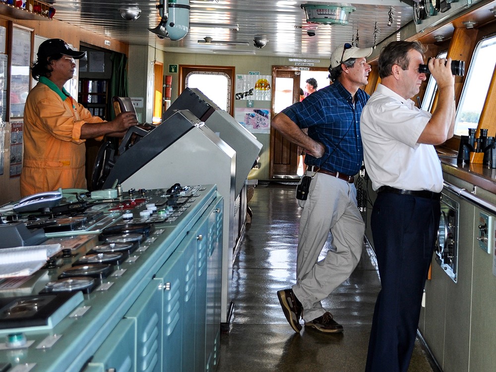 Maritime security adviser briefing a merchant vessel bridge team before transit
